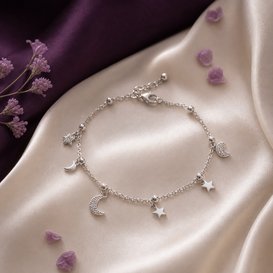 Moon star silver charm bracelet on ivory silk